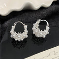 Hollow flower basket earrings